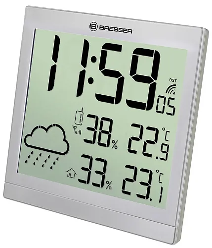 a fényképen:  Bresser TemeoTrend JC LCD RC időjárás állomás (falióra), ezüst